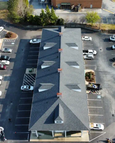 Newly installed roof on Quality Inn hotel by Xtreme Xteriors