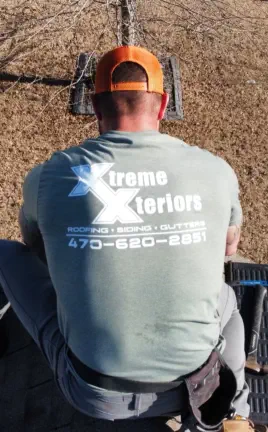 Andrew from Xtreme Xteriors Performing Roof Inspection