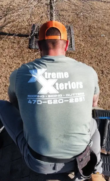 Andrew from Xtreme Xteriors Performing Roof Inspection