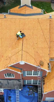 Xtreme Xteriors Roofing Crew Removing Old Roof for New Installation